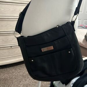 Tyler Rodan cross body purse. Excellent condition. Black. Leather? Similar